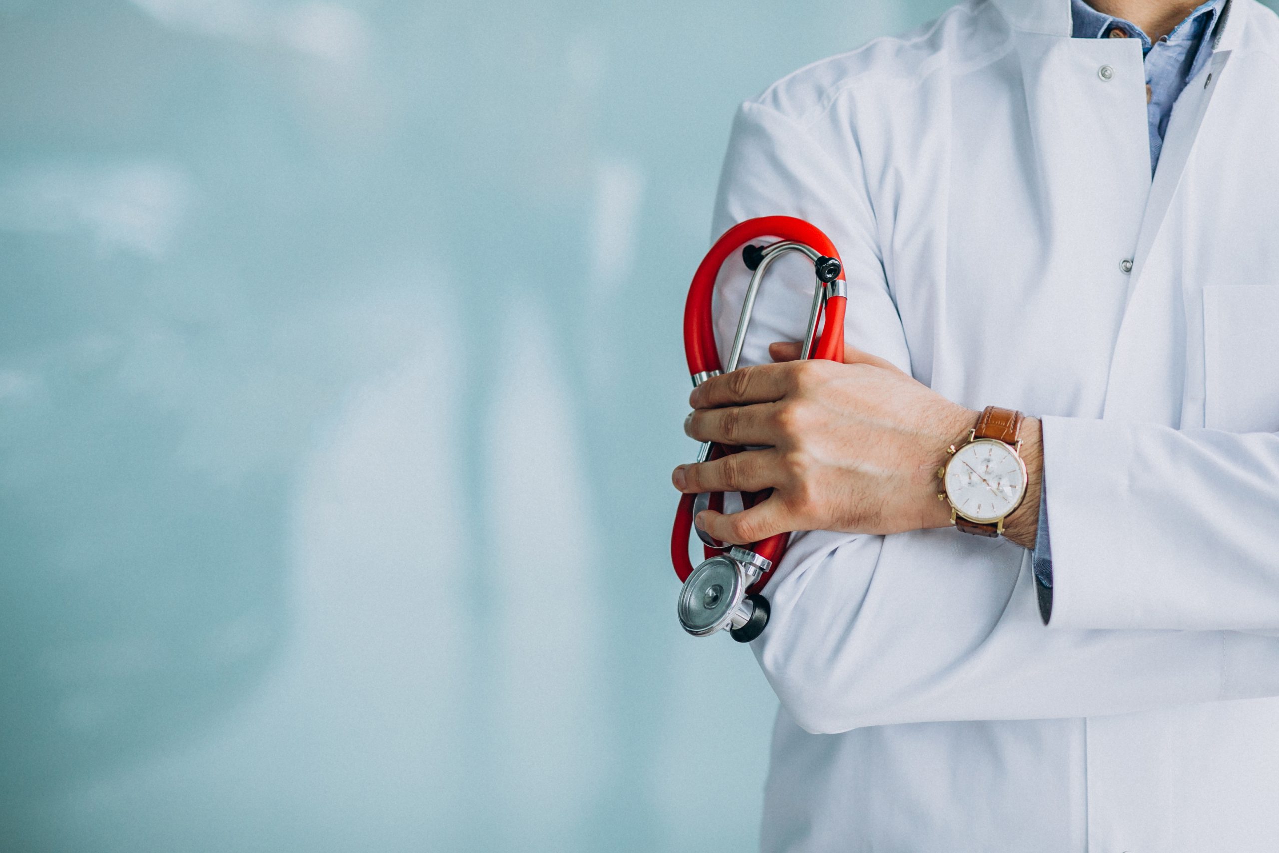 young-handsome-physician-medical-robe-with-stethoscope-scaled